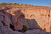 Caves in the cliff walls, used to store food by ancient Anasazi Indians, Canyon De Chelly National Monument, Arizona, United States of America, North America
