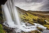Hafrafell waterfall in mountains near the port of Stykkisholmur, Snaefellsnes peninsula, western Iceland, Polar Regions