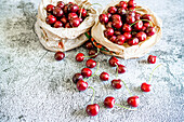 Fresh ripe cherries on a table at springtime, Italy, Europe