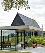 Glass pavilion, as part of a renovated farm