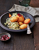 Cheese dumplings with cabbage salad (Switzerland)