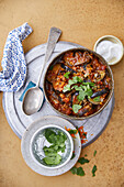 Aubergine curry with onions, tamarind paste and coconut yoghurt (vegan)