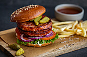 Pork Burger with pickle and french fries