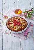 Summer crumble cake with hazelnuts and fruit