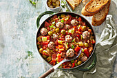Tomato and pepper stew with meatballs