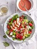 Strawberry and spinach salad with grilled chicken