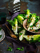 Crisp lettuce wedges with creamy lemon dressing