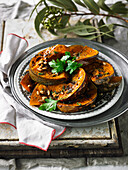 Pumpkin with pine nuts and balsamic dressing
