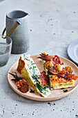 Spinach ricotta cake with balsamic onions and bacon