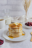 Buttermilk pancakes with maple syrup and a knob of butter