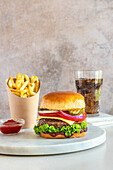 Beef burger with fries and drink