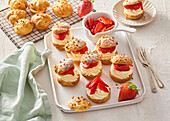 Cream puffs with strawberries and cream