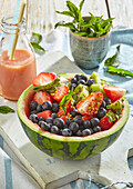 Summer fruit salad in a watermelon bowl