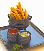 French fries with ketchup and mayonnaise