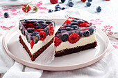 Cake with raspberries and blueberries in jelly