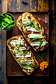 Cabbage steak topped baguette with camembert cheese