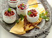 Skyr cream with stewed plums in jars