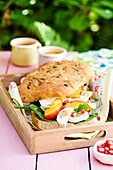 Foccacia picnic loaf with goat's cheese and nectarines