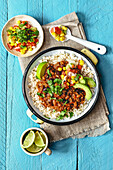 Mexican chili bowl with corn and avocado