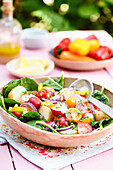 Summer bounty salad with potatoes, spinach, and tomatoes