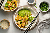 Tofu rice bowl with avocado
