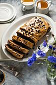 Mocha loaf cake with latte icing and chocolate chips