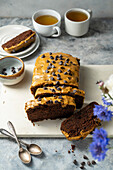 Mocha loaf cake with latte icing and chocolate chips