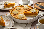 Pumpkin pie with whipped cream