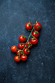 Cherry tomatoes on a blue background