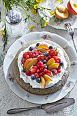 Poppy seed cake with fresh fruit and cream