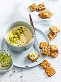 Egg spread with avocado, cress and crackers