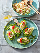 Couscous and radish salad in lettuce cups
