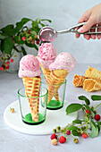 Homemade raspberry ice cream (cream, condensed milk, and raspberry puree)