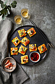 Crispy rice squares with sushi topping