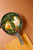 Persian fried eggs with spinach and onions