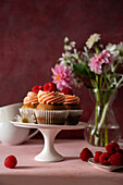 Cupcakes with raspberries