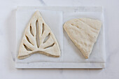Moulded dough pieces for fougasse with rosemary