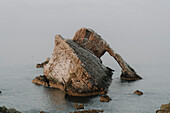 Majestic rock formation in sea, Portknockie, Aberdeenshire, Scotland\n