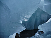 Close up blue iceberg melting, Antarctic Peninsula, Weddell Sea, Antarctica\n