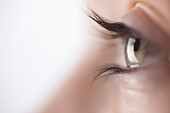 Extreme close up of young woman eye\n