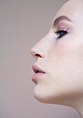 Close up profile of beautiful young woman\n