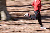 Portrait of man body running in the park\n