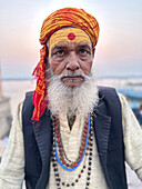 Half-length portrait of a Sadhu, Varanasi, Uttar Pradesh, India\n