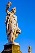 Statue of Autumn, Ponte Santa Trinita, Florence (Firenze), Tower of Palazzo Vecchio, UNESCO World Heritage Site, Tuscany, Italy, Europe\n