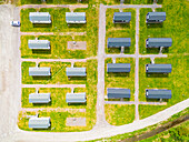 Aerial view of symmetrical rows of houses\n