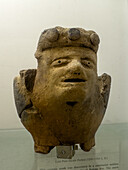 A Mayan ceramic effigy censor in the visitors center museum in the Cahal Pech Archeological Reserve in San Ignacio, Belize.\n