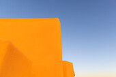 USA, New Mexico, Santa Fe, Adobe walls against blue sky\n