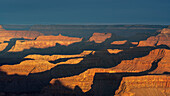 Aerial view of south rim of Grand Canyon at sunset\n