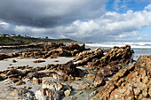 South Africa, Hermanus, Rocky coastline of Atlantic Ocean in Kammabaai Beach\n