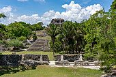 Structure A-13 in Plaza A-2 in the foreground with El Castillo behind in the Xunantunich Archeological Reserve in Belize.\n